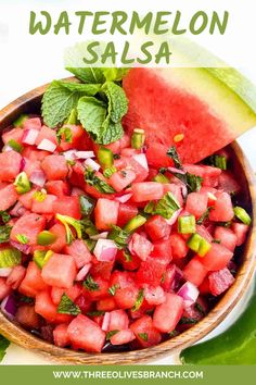 watermelon salsa in a wooden bowl with limes and mint