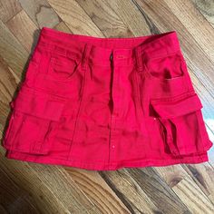 Shein Red Cargo Skirt! Never Worn Still Has The Tags On. Size 26, I Am Normally A 24-25 Waist And It Fits Me Perfectly. Super Super Cute! Cotton Mini Skirt In Y2k Style, Trendy Mini Cotton Bottoms, Y2k Mini Cotton Skirt, Y2k Style Cotton Mini Skirt, Y2k Style Mini Cotton Skirt, Red Fitted Y2k Bottoms, Red Skirt With Pockets For Spring, Red Spring Skirt With Pockets, Red Cotton Mini Denim Skirt