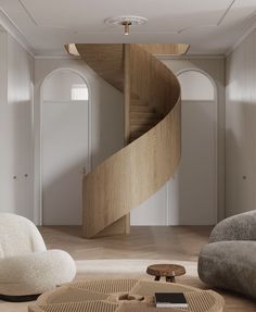 a spiral staircase in the middle of a living room