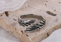 This ring is literally one of the cutest ever. If you like the birds, angels or any kind of animal with feathers this is definitely something for you. It has a warm nature vibe to it. It has a dark tint to it that also gives it that fabulous vintage, antique look but still looks modern.  The ring is adjustable and can fit on multiple fingers. It's pretty strong too so you can switch which finger you want to wear it on. It's made of sterling silver, s925. The design is very minimalist with just a pair of wings almost meeting. The ring is lightweight, just about 5g. Wing Ring, Bird Ring, Bird Rings, Bird Wings, Look Vintage, The Birds, Bohemian Chic, Looks Vintage, Adjustable Ring