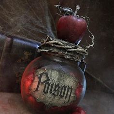 an apple sitting on top of a metal container with the word flesh written on it