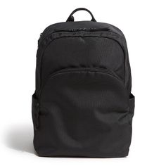 a black backpack sitting on top of a white floor