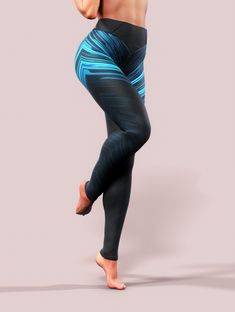 Stretch Leggings With Built-in Shorts For Pilates, Compression Leggings With Built-in Shorts For Pilates, Sporty Compression Leggings With Built-in Shorts, Stretch Blue Pants With Built-in Shorts, Stretch Leggings With Built-in Shorts For Sports, Sportswear Bottoms For Pilates, Mid-thigh Length, Functional Blue Training Leggings, Moisture-wicking Sportswear Bottoms For Cycling, Sporty Blue Yoga Bottoms