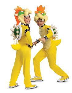 two people in yellow costumes are dancing