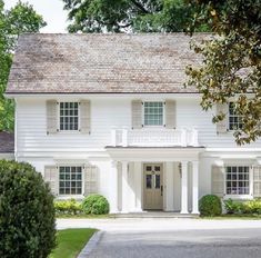 a large white house with columns and windows