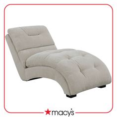 the chaise lounge chair is white and has a black leg rest on top of it