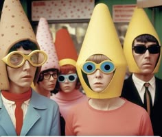 several people wearing funny hats and goggles