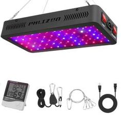 a large led grow light that is hanging from the ceiling