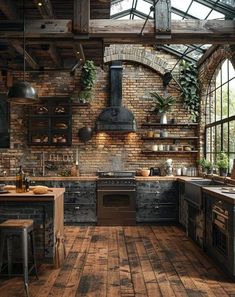 an industrial style kitchen with exposed brick walls and wood flooring is featured in this image