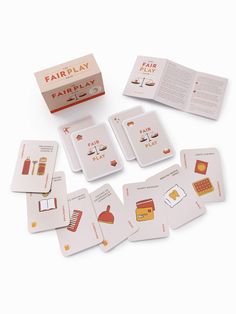 the card game fair play is set up on a white surface with its contents and instructions