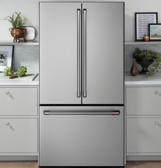 a large stainless steel refrigerator in a kitchen