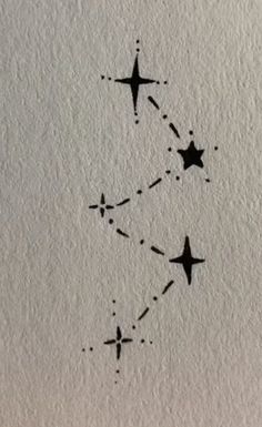 two stars are drawn on the wall with black ink