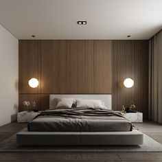 a large bed sitting in the middle of a bedroom next to two lamps on either side of it