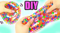 two hands holding colorful beads with the words diy