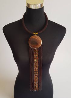 This listing is for ALL 9 beaded necklaces shown above. These necklaces are 100% handmade. They come in different colors and designs. Buy multiple items and pay shipping for ONE item ONLY. They ship through DHL Express. More neckleces here; https://www.etsy.com/shop/TribalTess?ref=seller-platform-mcnav&section_id=21306083 Back to my shop; https://www.etsy.com/shop/TribalTess?ref=seller-platform-mcnav Masai Jewelry, Maroon Necklace, African Necklaces, Necklaces Beaded, Wholesale Necklaces, Bone Necklace, African Necklace, Bone Pendant, Gold Bead Necklace