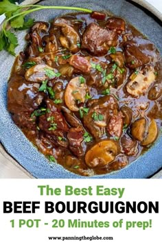 beef bourguignon recipe with mushrooms and parsley in a blue bowl