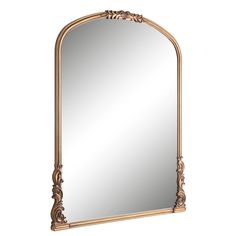 an ornate gold framed mirror on a white background