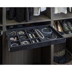 an organized closet with shoes and jewelry