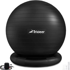 a black exercise ball sitting on top of an inflatable stand with the word trader written on it