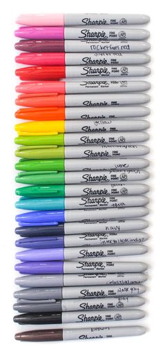 the sharpie markers are lined up in different colors