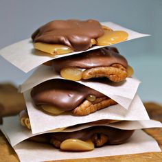 chocolate covered cookies stacked on top of each other with the words homemade turtles written above them