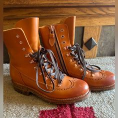 The Office Of Angela Scott | Mr. Bernard Leather Combat Boots The Office Of Angela Scott Leather "Mr. Bernard" Combat Boot Is In Amber Italian Vegetable Tan Leather With Recycled Rubber Lug Sole Soft Leather Lining, Cork Midsole That Shapes To Foot, With Zip Closure At Interior Sides And Upper Lace Tie At Vamp, And This Unique Style Has Natural Distressing. Size: Eu 38.5, Us 8/8.5 Still Like New, Some Signs Of Wear On The Toe Of The Boot. Office Of Angela Scott Shoes, Angela Scott Shoes, Office Of Angela Scott, Leather Combat Boots, Lace Tie, Combat Boot, Recycled Rubber, Lug Sole, Lace Up Boots