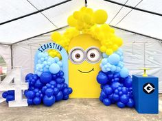 balloon decorations are displayed in front of a tent