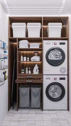 a washer and dryer sitting in a room next to each other on shelves