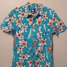 Nwt. Teal Hawaiian Printed Mens Button Down Shirt. Lightweight Fabric. New, Never Worn. Super Fun For Summer Or Vacation. Always Open To Offers! Blue Camp Shirt With Buttons For Vacation, Blue Short Sleeve Button-up Summer Shirt, Blue Cotton Short Sleeve Shirt For Beach, Blue Cotton Short Sleeve Shirt For The Beach, Blue Button-up Short Sleeve Summer Shirt, Blue Button-up Camp Shirt For Spring, Blue Button-up Summer Camp Shirt, Blue Button-up Camp Shirt For Summer, Blue Cotton Button-up Camp Shirt