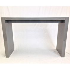 a gray table with a white background