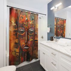 a bathroom with a shower curtain that has an image of a woman's face on it