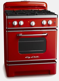 a black stove top oven sitting on top of a white floor