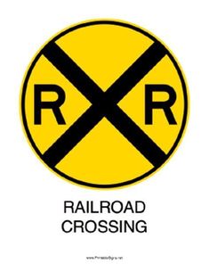 the railroad crossing sign is shown in black and yellow