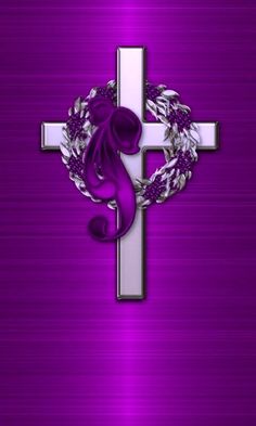 the cross with purple ribbon and wreath on it is displayed in front of a purple background