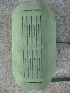 a close up of a green object on the ground