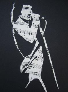 a black and white drawing of a man holding a microphone with sheet music on it