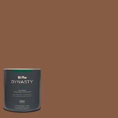 a brown paint with the words dynastity on it and a black canister