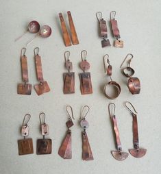 Dirty copper collection, Flame patina long copper earrings Collection of earrings that have an organic look thanks to handshaping soft copper after heating.  Flame patina on copper varies from dark brown to orange with many shades in between. It is such a pleasure watching the copper change the color while heating, and while cooling down.  The outcome is always a surprise! All the pieces were handcut and joined with copper wire balled at ends. That way, all the parts are moovable. There are 8 pa Jewelry Homemade, Rivet Jewelry, Hard Crafts, Cold Connections, Copper Earrings Handmade, Copper Collection, Silversmithing Jewelry, Organic Earrings, Copper Work