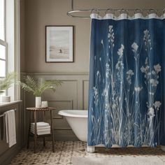 a bath room with a tub and a shower curtain