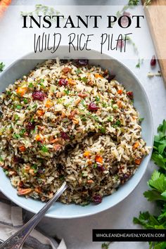 instant pot wild rice pilaf in a bowl with carrots and parsley