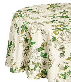 the table cloth has flowers and leaves on it