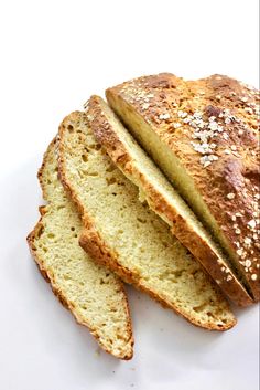 sliced loaf of bread sitting on top of a white plate