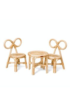 two chairs and table made out of bamboo