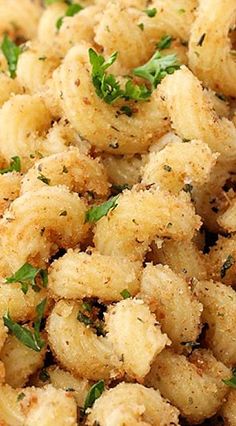 fried food with herbs and seasoning on top