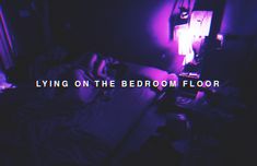 living on the bedroom floor with purple light