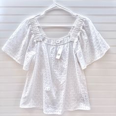 New With Tags. In Excellent Condition. No Flaws. Never Been Worn. In White Eyelet. Size S. Gap Squareneck Flutter Sleeve Eyelet Top In White Nwt Features: Square Neck Flutter Sleeves Eyelet Details 100% Cotton Measurements: Length: 24” Bust: 20” Pit To Pit Bundle And Save! Ships Same/ Next Business Day! Casual Gap Tops With Flutter Sleeves, Gap Casual Tops With Flutter Sleeves, Gap Ruffled Tops For Summer, Summer Ruffled Tops By Gap, Summer Ruffled Tops From Gap, Gap Ruffled Short Sleeve Tops, Gap Casual Flutter Sleeve Tops, Gap Summer Tops For Vacation, Gap Tops For Spring Vacation