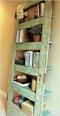 an old door has been transformed into a shelf with books on it and the words, pretty cool old door hacks