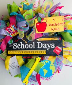 the school days wreath is decorated with colorful ribbons