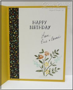 a happy birthday card with flowers on it