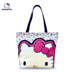 Nip Sanrio’s Hello Kitty Tote Bag Cute White Bags For Daily Use, Kawaii White Bag For Daily Use, White Kawaii Bag For Daily Use, Cute White Shopping Bag, Trendy Hello Kitty School Bag, Cute Shoulder Bag With Cat Design, Kawaii Hello Kitty Print Rectangular Bag, Trendy Hello Kitty Rectangular Shoulder Bag, Cute Cat Design Shoulder Bag For Daily Use